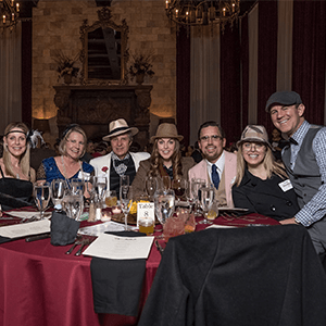 Houston Murder Mystery party guests at the table