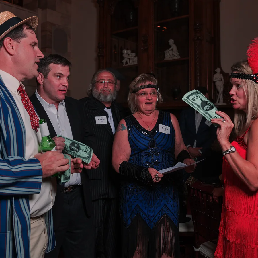 Guests at a Murder Mystery Company public dinner show in Houston