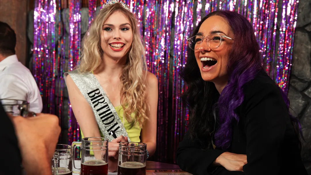 Guests celebrating at a Houston murder mystery party