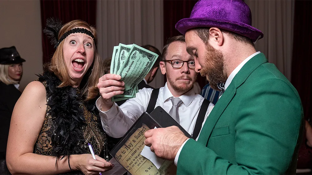 Guests enjoying a Houston murder mystery party